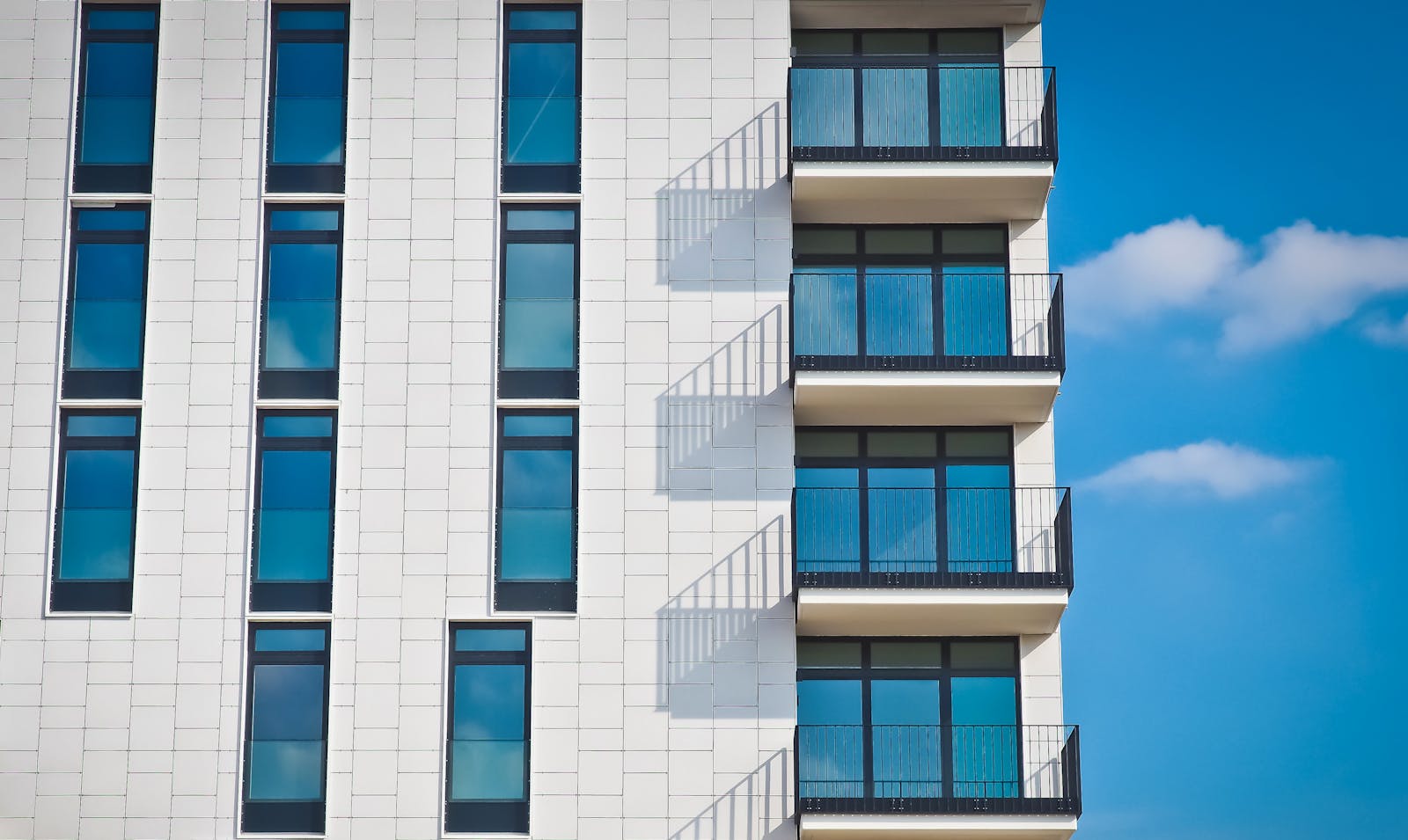 Low-angle Photography of Gray Concrete Building